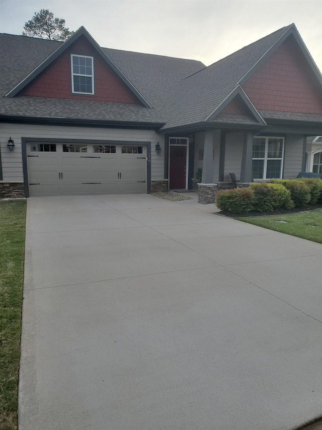 178 Ravines Ln, Spartanburg, SC 29301 - craftsman-style house with a porch, driveway, and a shingled roof