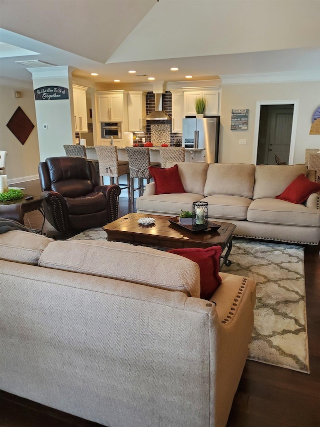 178 Ravines Ln, Spartanburg, SC 29301 - living room featuring dark wood-type flooring, recessed lighting, ornate columns, and vaulted ceiling
