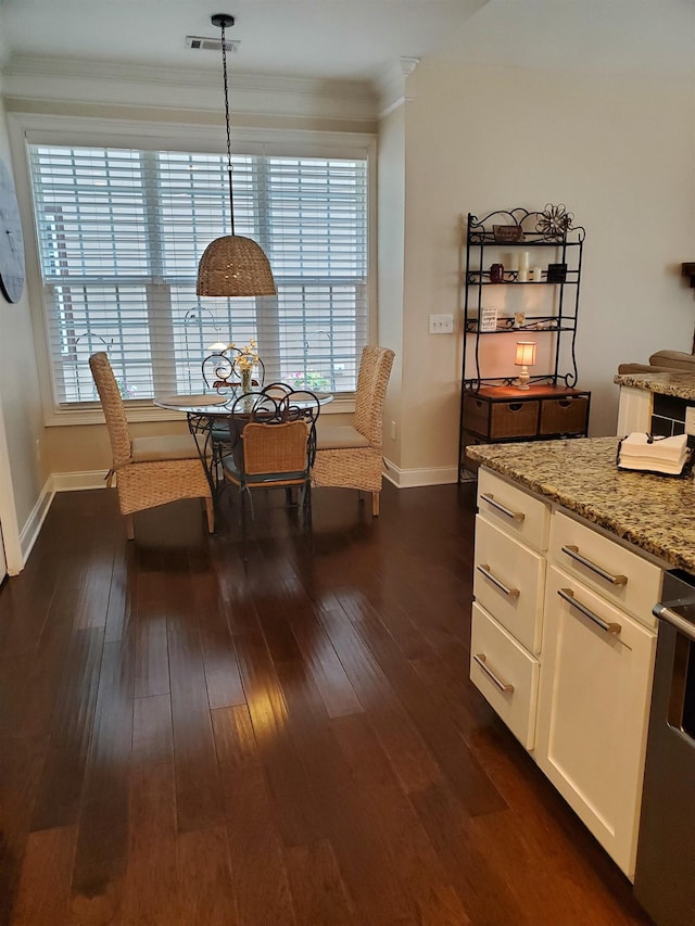 178 Ravines Ln, Spartanburg, SC 29301 - dining room featuring plenty of natural light, ornamental molding, and dark wood finished floors