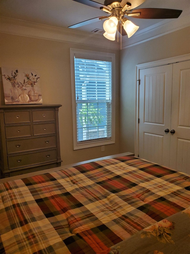 178 Ravines Ln, Spartanburg, SC 29301 - bedroom featuring crown molding, a closet, and a ceiling fan