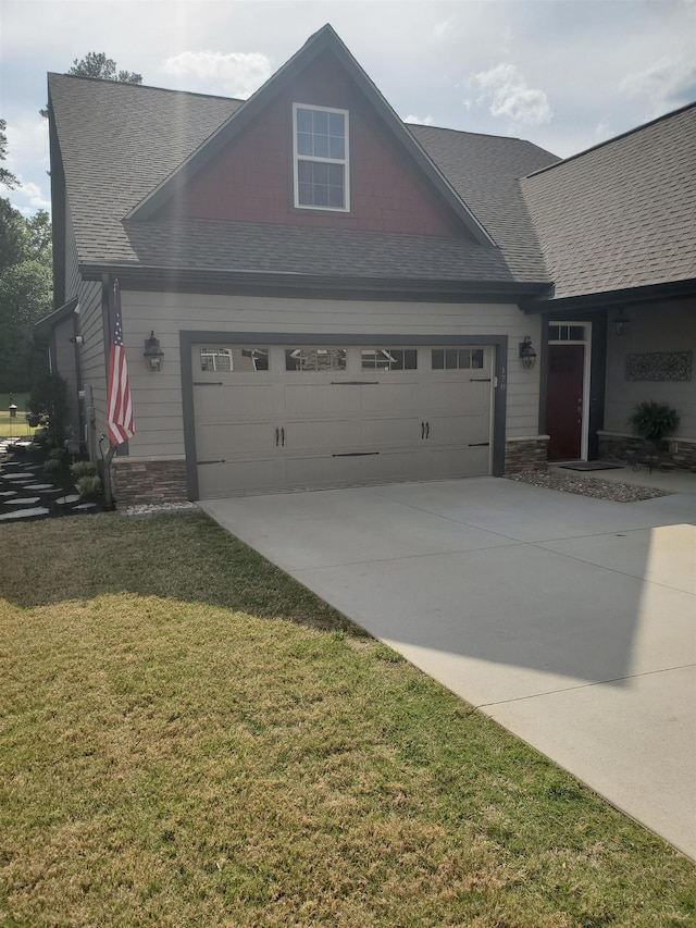 178 Ravines Ln, Spartanburg, SC 29301 - view of front of property with an attached garage, concrete driveway, a shingled roof, and a front lawn