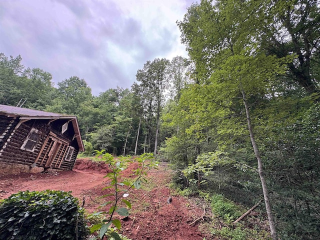8875 N Tigerville Rd, Travelers Rest, SC 29690 - view of yard with a wooded view