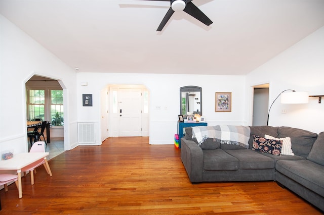 72 Casey Ln, Spartanburg, SC 29301 - living room with light wood-style floors, ceiling fan, arched walkways, and vaulted ceiling