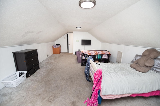 72 Casey Ln, Spartanburg, SC 29301 - bedroom featuring vaulted ceiling, a textured ceiling, and carpet flooring