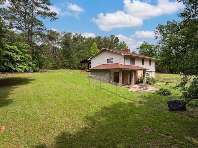 1342 Old Canaan Rd, Spartanburg, SC 29306 - rear view of property featuring a chimney and a patio