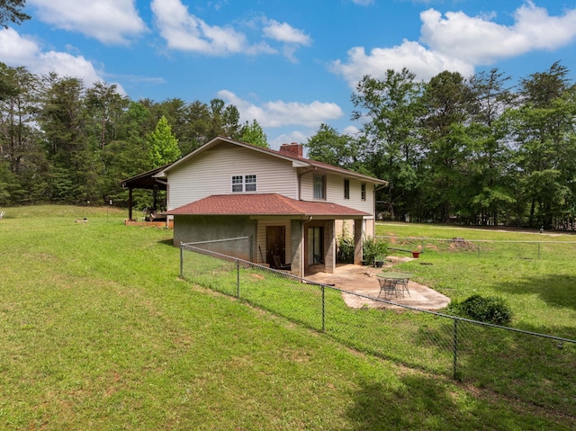 1342 Old Canaan Rd, Spartanburg, SC 29306 - back of property featuring a patio area and a chimney