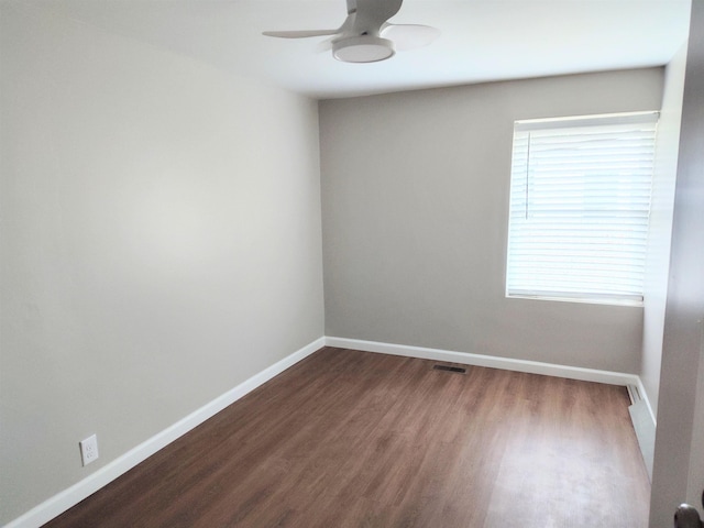117 Sycamore St, Pacolet, SC 29372 - empty room featuring dark wood finished floors and ceiling fan