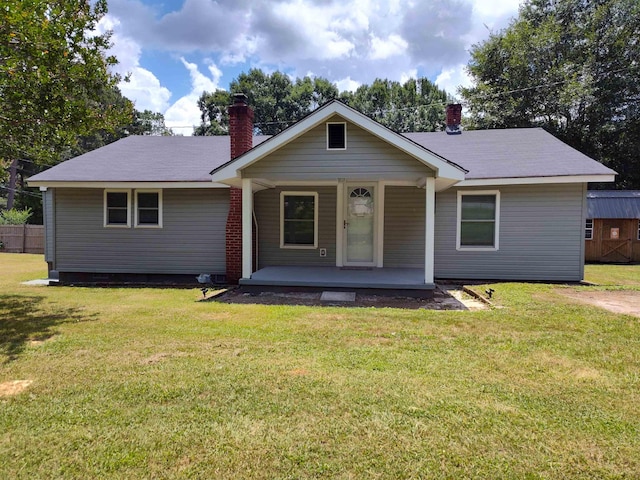 117 Sycamore St, Pacolet, SC 29372 - view of front of house featuring a porch, a chimney, and a front lawn