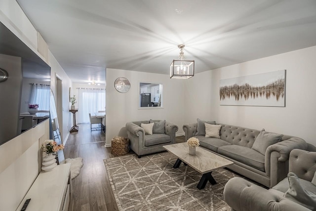 521 Signal Hill Ln, Inman, SC 29349 - living area with a chandelier and dark wood-style flooring