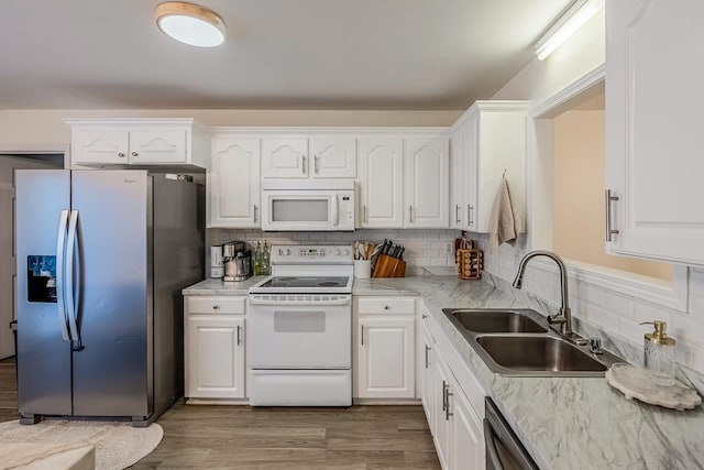 521 Signal Hill Ln, Inman, SC 29349 - kitchen with white appliances, white cabinetry, and decorative backsplash