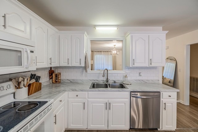 521 Signal Hill Ln, Inman, SC 29349 - kitchen featuring white appliances, white cabinets, backsplash, and wood finished floors
