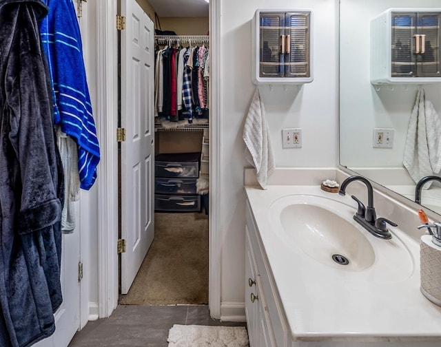521 Signal Hill Ln, Inman, SC 29349 - bathroom with vanity and a walk in closet