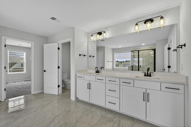 3027 Toliver, Boiling Springs, SC 29316 - bathroom with double vanity, a stall shower, marble finish floors, and plenty of natural light