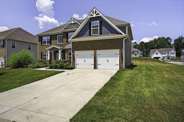 3027 Toliver, Boiling Springs, SC 29316 - view of front of property featuring a front yard, concrete driveway, brick siding, and a garage