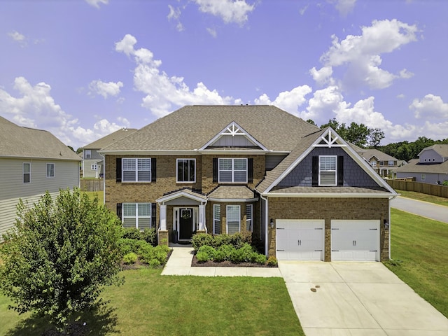 3027 Toliver, Boiling Springs, SC 29316 - view of front of house with concrete driveway, brick siding, a garage, and a shingled roof