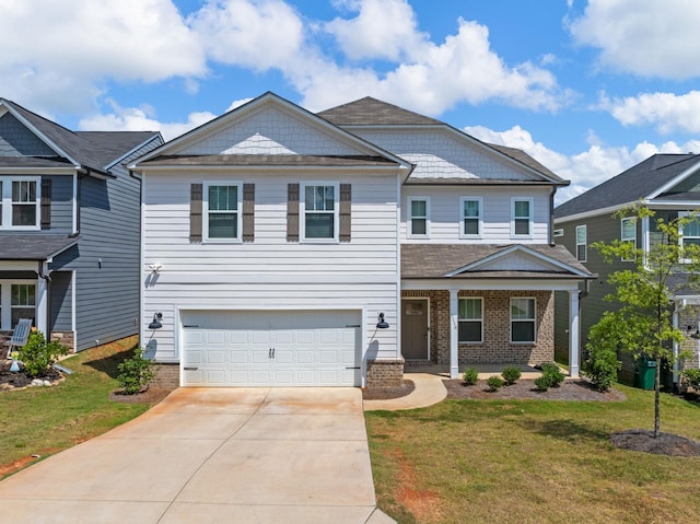 1116 Denington Dr, Spartanburg, SC 29307 - view of front facade featuring brick siding, driveway, a front lawn, and a garage