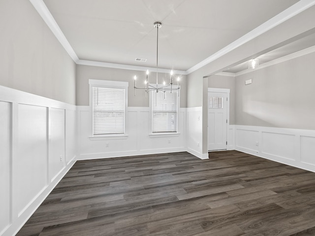 1116 Denington Dr, Spartanburg, SC 29307 - unfurnished dining area featuring a chandelier, crown molding, wainscoting, and dark wood-type flooring