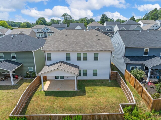 1116 Denington Dr, Spartanburg, SC 29307 - rear view of property featuring a patio, a residential view, and a fenced backyard