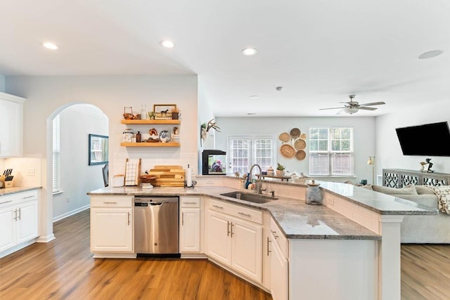 222 Eventine Way, Boiling Springs, SC 29316 - kitchen with dishwasher, arched walkways, a peninsula, ceiling fan, and open floor plan