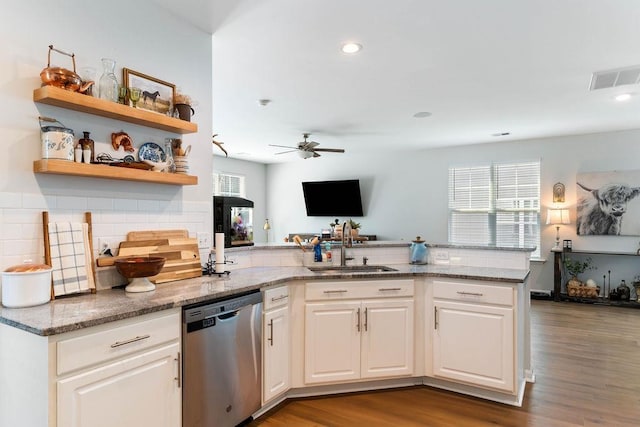 222 Eventine Way, Boiling Springs, SC 29316 - kitchen featuring dishwasher, a ceiling fan, decorative backsplash, light stone countertops, and a peninsula