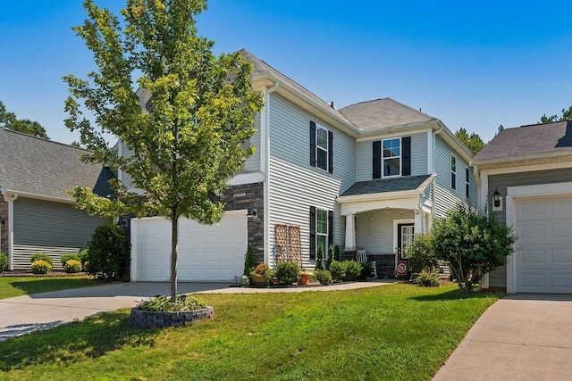 222 Eventine Way, Boiling Springs, SC 29316 - view of front of property with driveway, a front lawn, stone siding, and an attached garage