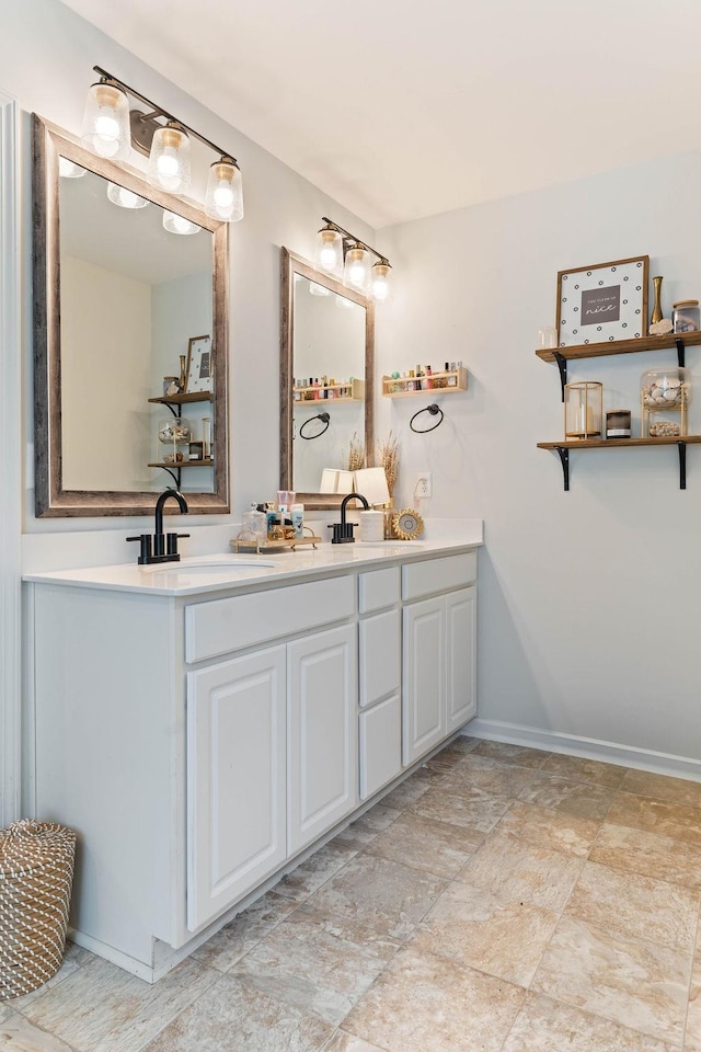 222 Eventine Way, Boiling Springs, SC 29316 - bathroom featuring double vanity and stone finish flooring