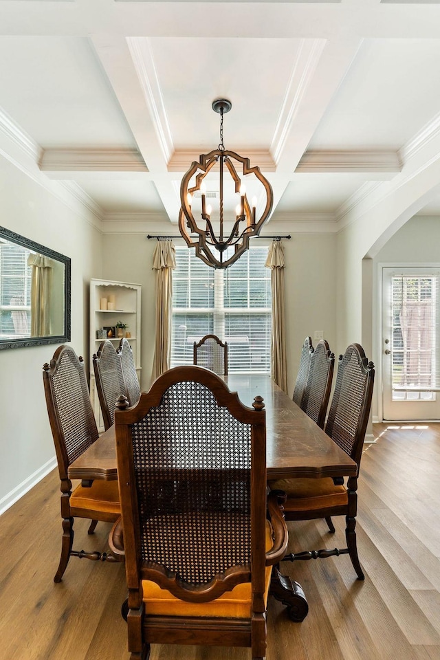 222 Eventine Way, Boiling Springs, SC 29316 - dining area with a chandelier, wood finished floors, beamed ceiling, arched walkways, and crown molding