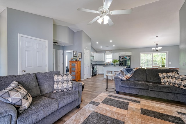 286 Heatherbrook Dr, Lyman, SC 29365 - living area with light wood-style floors, lofted ceiling, recessed lighting, a ceiling fan, and a chandelier
