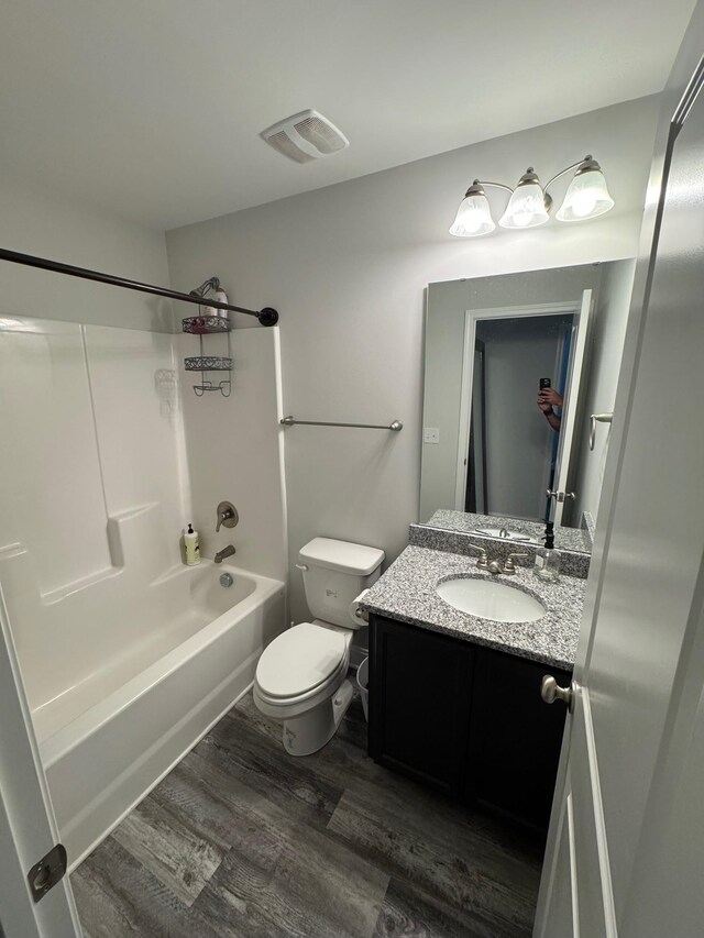 711 Burbrook Ln, Boiling Springs, SC 29316 - bathroom featuring wood finished floors, vanity, and shower / bath combination