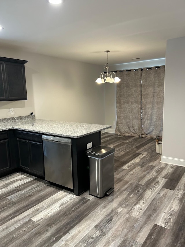 711 Burbrook Ln, Boiling Springs, SC 29316 - kitchen featuring dishwasher, wood finished floors, light stone countertops, and a peninsula