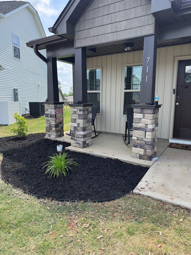 711 Burbrook Ln, Boiling Springs, SC 29316 - view of exterior entry with board and batten siding and a porch