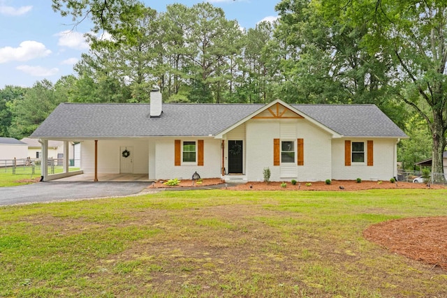 15864 Asheville Hwy, Campobello, SC 29322 - single story home featuring asphalt driveway, a chimney, a carport, a shingled roof, and brick siding
