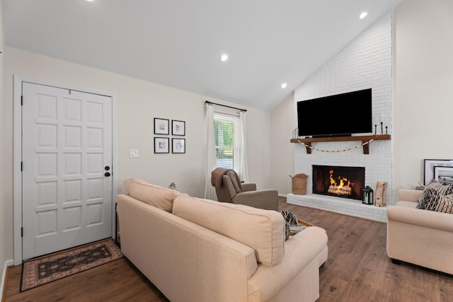 15864 Asheville Hwy, Campobello, SC 29322 - living area with vaulted ceiling, wood finished floors, a fireplace, and recessed lighting