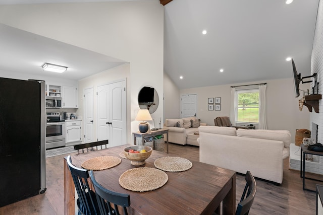 15864 Asheville Hwy, Campobello, SC 29322 - dining room with dark wood-style flooring, recessed lighting, and high vaulted ceiling