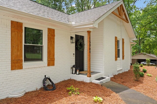15864 Asheville Hwy, Campobello, SC 29322 - doorway to property with brick siding and a shingled roof