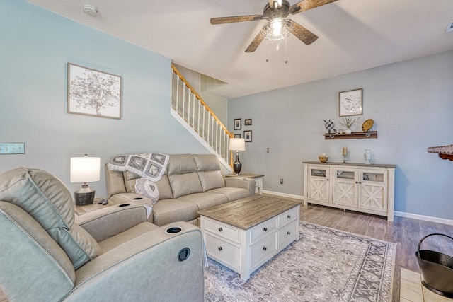 316 Crestview Ln, Spartanburg, SC 29301 - living area with a ceiling fan, light wood-style flooring, and stairway