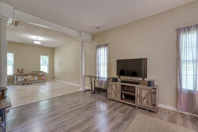 316 Crestview Ln, Spartanburg, SC 29301 - living room with ornate columns and wood finished floors