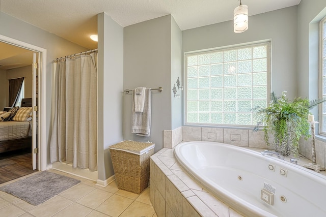 316 Crestview Ln, Spartanburg, SC 29301 - ensuite bathroom featuring a whirlpool tub, tile patterned floors, and a shower with shower curtain
