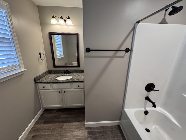 313 Trail Crossing Ln, Inmann, SC 29349 - full bathroom with vanity, bathing tub / shower combination, and wood finished floors