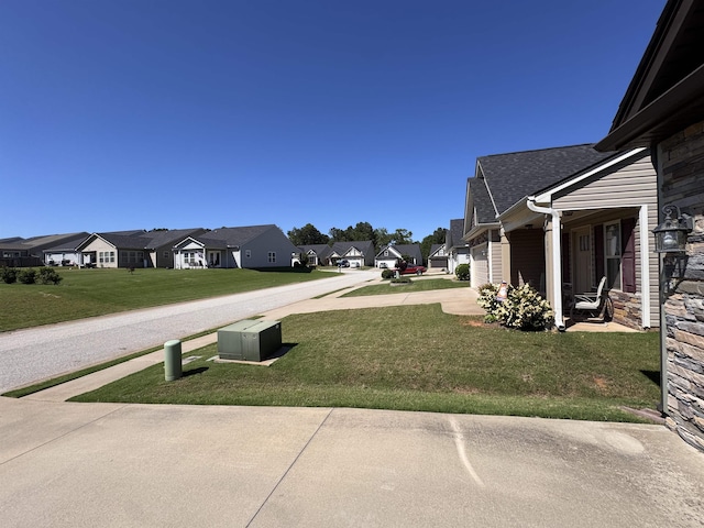 313 Trail Crossing Ln, Inmann, SC 29349 - view of grassy yard with a residential view and driveway