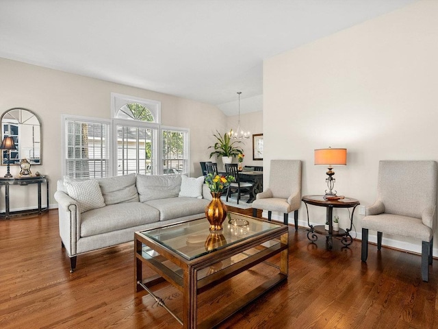 135 N Fairview Ave, Spartanburg, SC 29302 - living room featuring wood finished floors and a chandelier