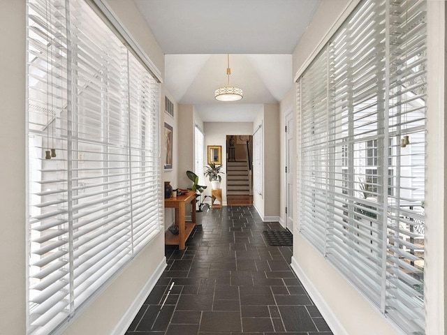 135 N Fairview Ave, Spartanburg, SC 29302 - hallway with baseboards and stone tile flooring