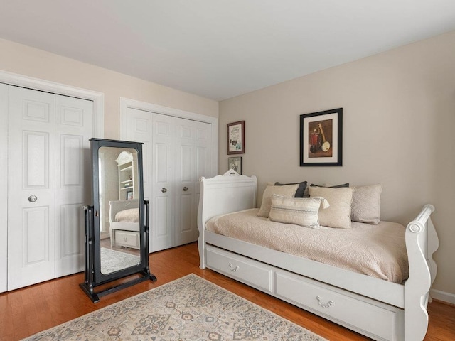 135 N Fairview Ave, Spartanburg, SC 29302 - bedroom with wood finished floors and multiple closets