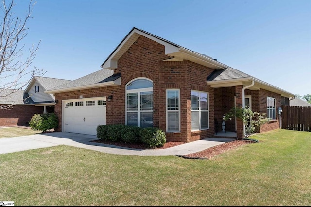 240 Stonecrest Dr, Roebuck, SC 29376 - view of front of property with brick siding, an attached garage, driveway, and a shingled roof