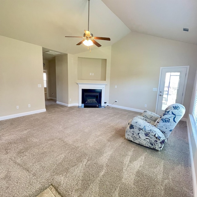 240 Stonecrest Dr, Roebuck, SC 29376 - unfurnished living room with a ceiling fan, lofted ceiling, carpet flooring, and a fireplace with flush hearth