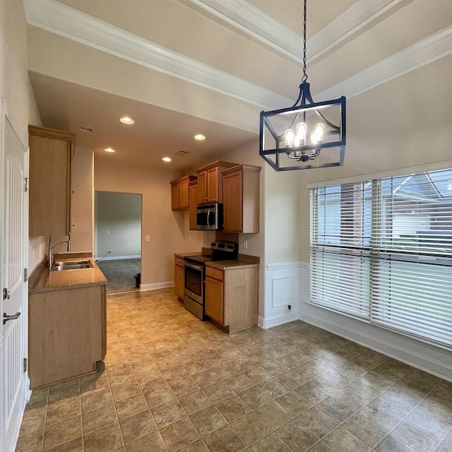 240 Stonecrest Dr, Roebuck, SC 29376 - kitchen featuring stainless steel appliances, ornamental molding, brown cabinets, a chandelier, and hanging light fixtures
