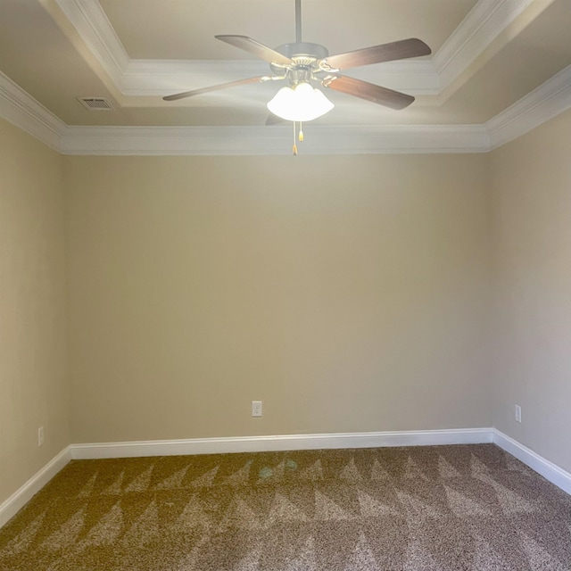 240 Stonecrest Dr, Roebuck, SC 29376 - empty room with dark carpet, a tray ceiling, crown molding, and a ceiling fan