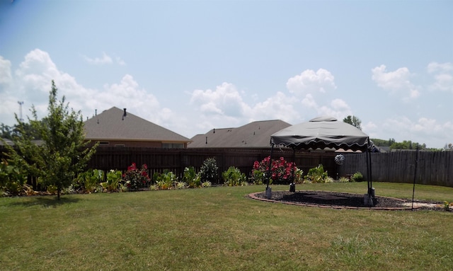 240 Stonecrest Dr, Roebuck, SC 29376 - fenced backyard with a gazebo