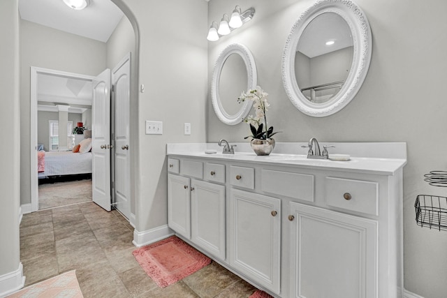332 Heritage Point Dr, Simpsonville, SC 29681 - ensuite bathroom featuring double vanity and baseboards