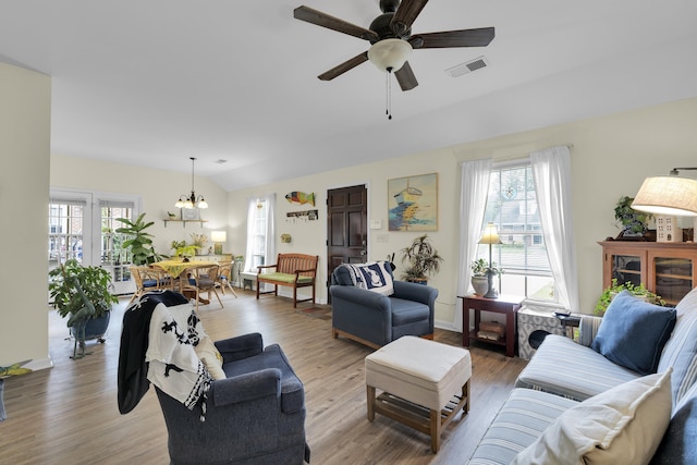 360 W Pointe Dr, Spartanburg, SC 29301 - living room with ceiling fan, light wood-style floors, lofted ceiling, and a chandelier